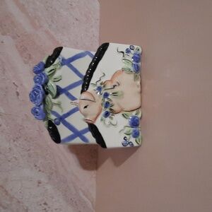 Blue Sky Ceramic Pig with Floral Accents Napkin holder by Elisabeth Pohle.